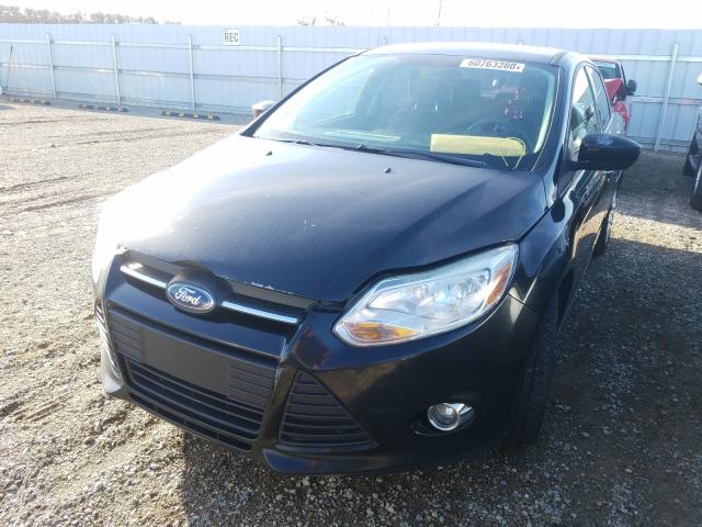 Photo 1 VIN: 1FAHP3F20CL242742 - FORD FOCUS SE 