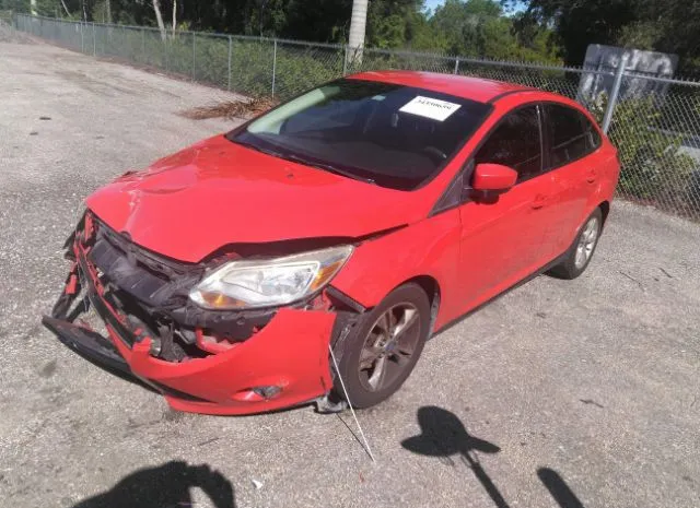 Photo 1 VIN: 1FAHP3F20CL307900 - FORD FOCUS 