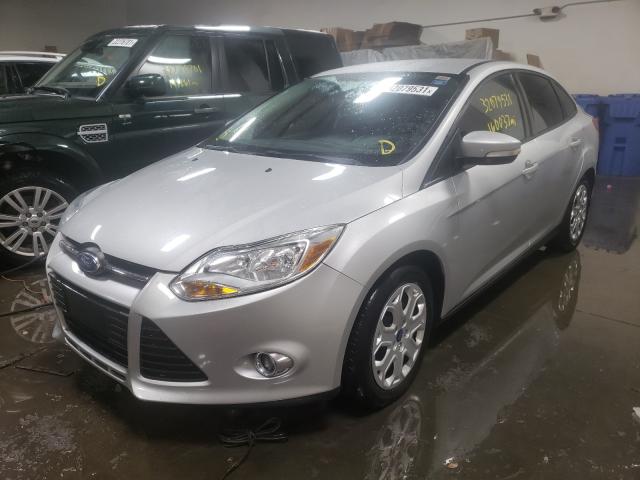 Photo 1 VIN: 1FAHP3F20CL330254 - FORD FOCUS SE 