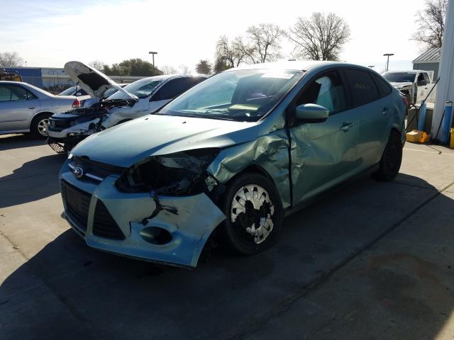 Photo 1 VIN: 1FAHP3F20CL356515 - FORD FOCUS SE 