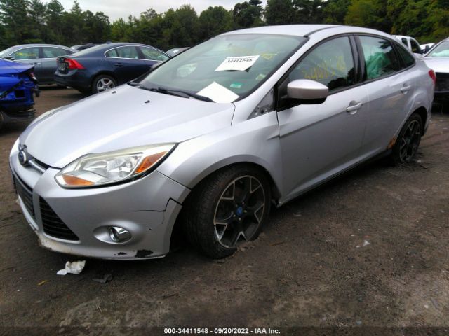 Photo 1 VIN: 1FAHP3F20CL389661 - FORD FOCUS 