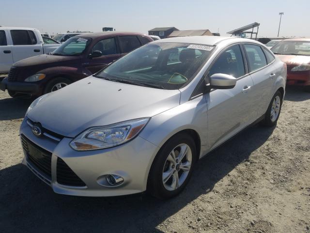 Photo 1 VIN: 1FAHP3F20CL429902 - FORD FOCUS SE 