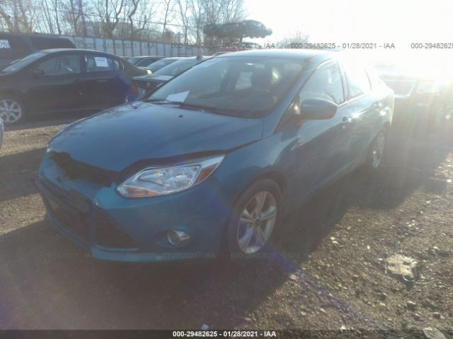 Photo 1 VIN: 1FAHP3F20CL433951 - FORD FOCUS 