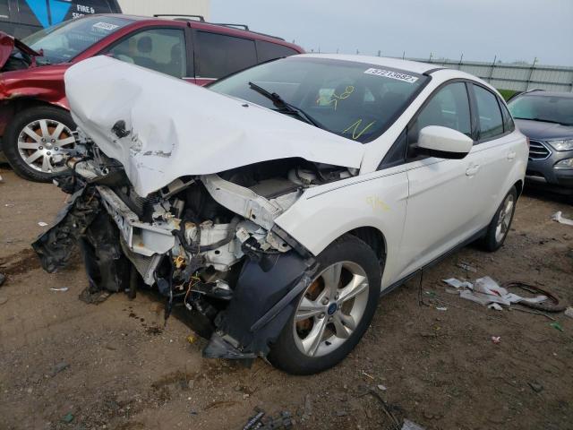 Photo 1 VIN: 1FAHP3F20CL475553 - FORD FOCUS SE 