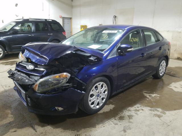 Photo 1 VIN: 1FAHP3F21CL100268 - FORD FOCUS SE 