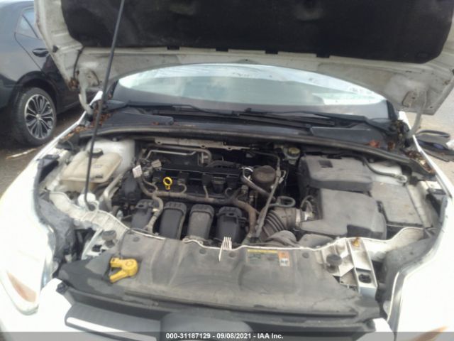 Photo 9 VIN: 1FAHP3F21CL282330 - FORD FOCUS 