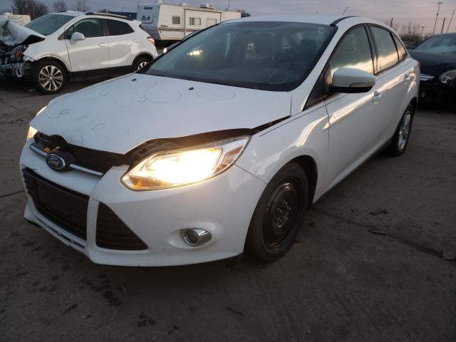 Photo 1 VIN: 1FAHP3F21CL304407 - FORD FOCUS SE 