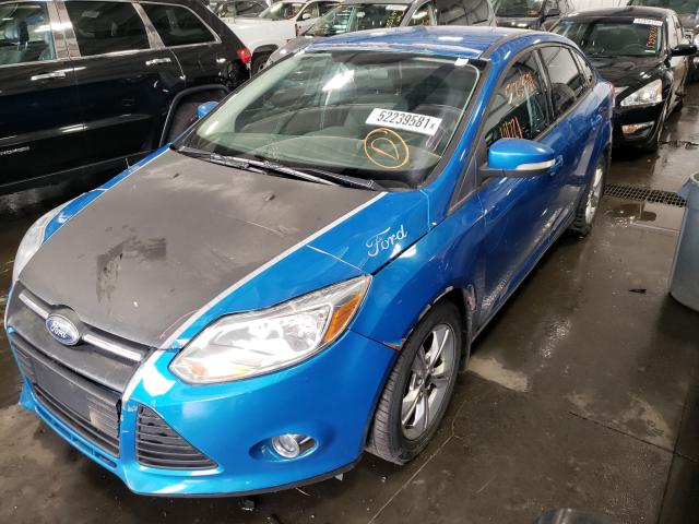 Photo 1 VIN: 1FAHP3F21CL334815 - FORD FOCUS 