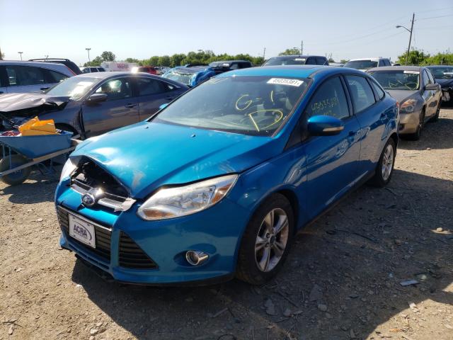 Photo 1 VIN: 1FAHP3F21CL354787 - FORD FOCUS SE 