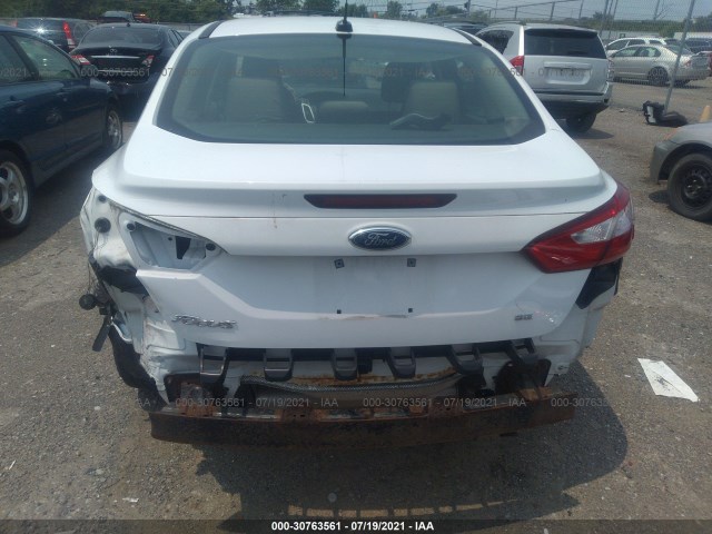 Photo 5 VIN: 1FAHP3F21CL381634 - FORD FOCUS 