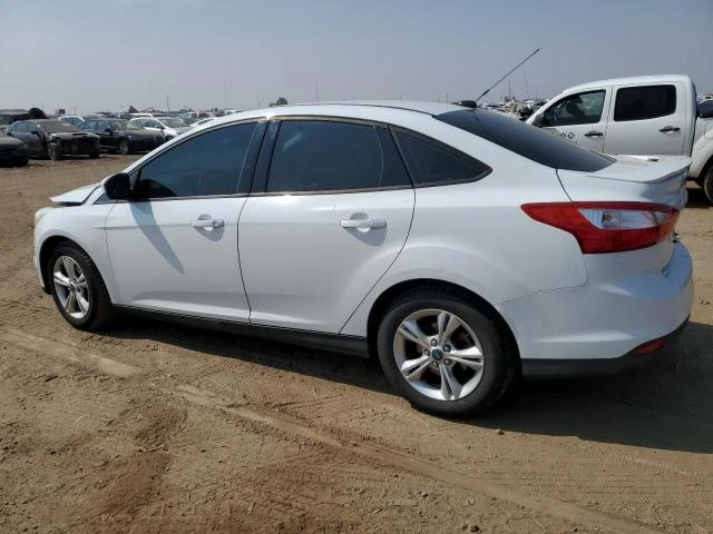 Photo 1 VIN: 1FAHP3F21CL450323 - FORD FOCUS SE 