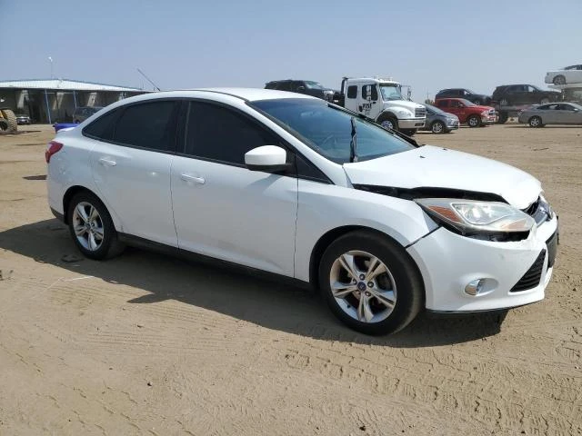 Photo 3 VIN: 1FAHP3F21CL450323 - FORD FOCUS SE 