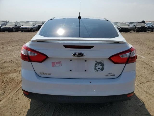 Photo 5 VIN: 1FAHP3F21CL450323 - FORD FOCUS SE 