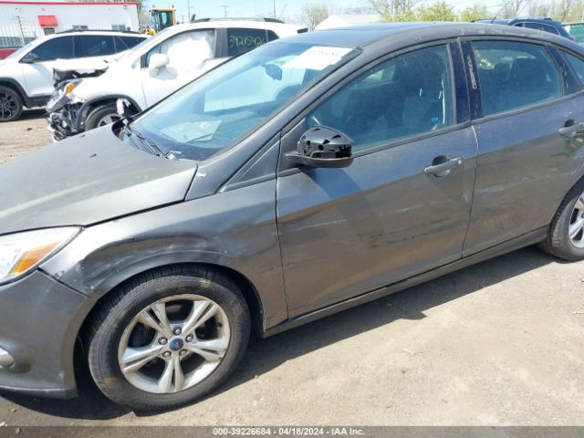 Photo 5 VIN: 1FAHP3F21CL475612 - FORD FOCUS 