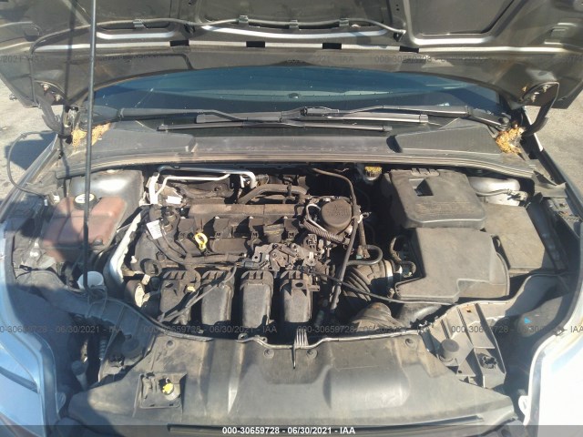 Photo 9 VIN: 1FAHP3F22CL124594 - FORD FOCUS 