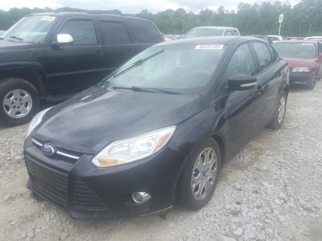 Photo 1 VIN: 1FAHP3F22CL208818 - FORD FOCUS SE 