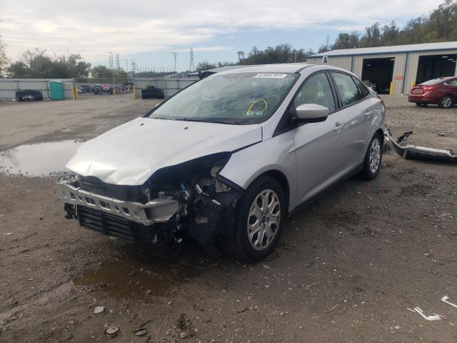 Photo 1 VIN: 1FAHP3F22CL299573 - FORD FOCUS SE 