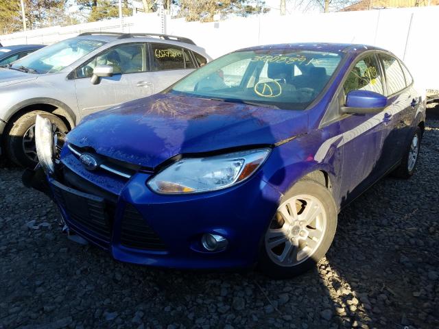 Photo 1 VIN: 1FAHP3F22CL327100 - FORD FOCUS SE 