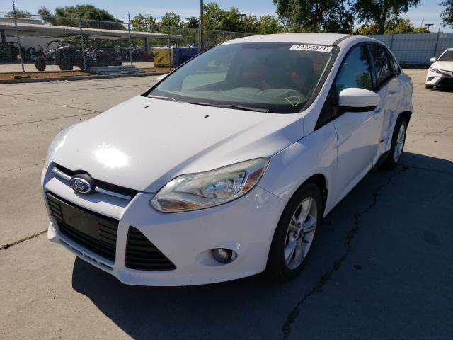 Photo 1 VIN: 1FAHP3F22CL435913 - FORD FOCUS SE 