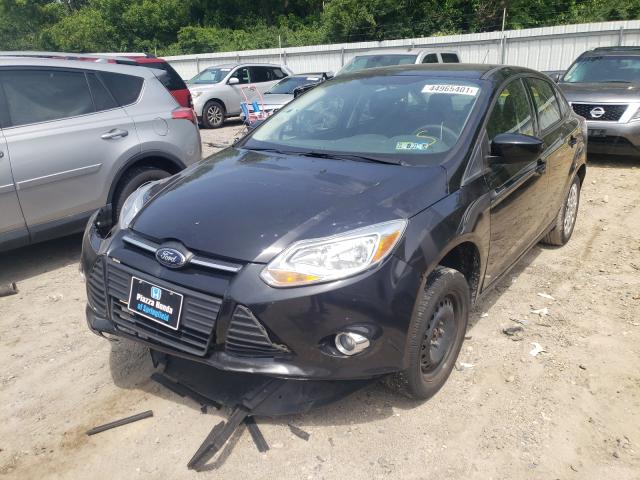 Photo 1 VIN: 1FAHP3F22CL460889 - FORD FOCUS SE 