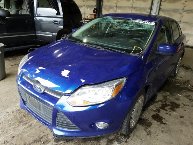 Photo 1 VIN: 1FAHP3F23CL207192 - FORD FOCUS SE 