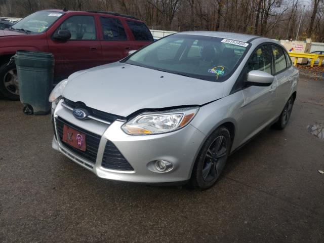 Photo 1 VIN: 1FAHP3F23CL220895 - FORD FOCUS SE 