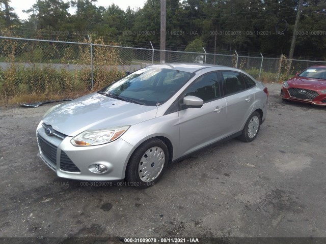 Photo 1 VIN: 1FAHP3F23CL277002 - FORD FOCUS 