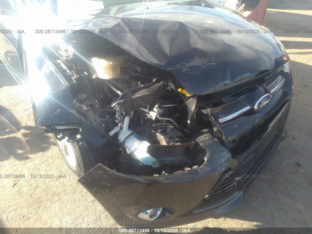 Photo 5 VIN: 1FAHP3F23CL304408 - FORD FOCUS 