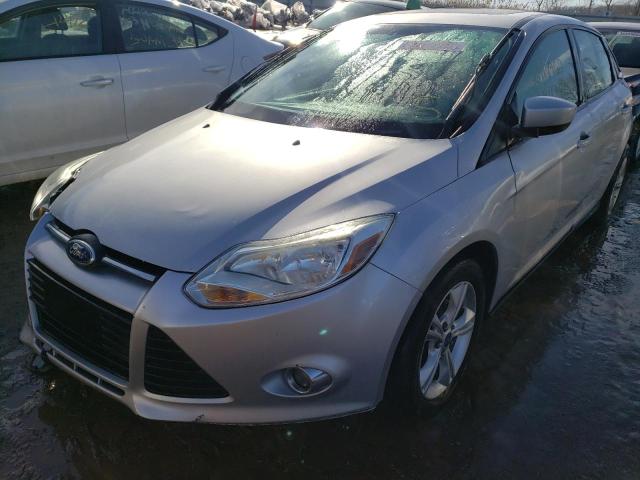 Photo 1 VIN: 1FAHP3F23CL307812 - FORD FOCUS SE 