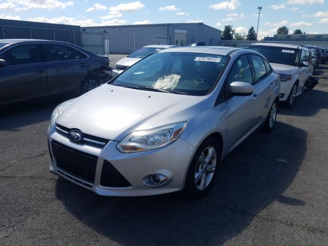 Photo 1 VIN: 1FAHP3F23CL307812 - FORD FOCUS SE 