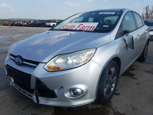 Photo 1 VIN: 1FAHP3F23CL314453 - FORD FOCUS SE 