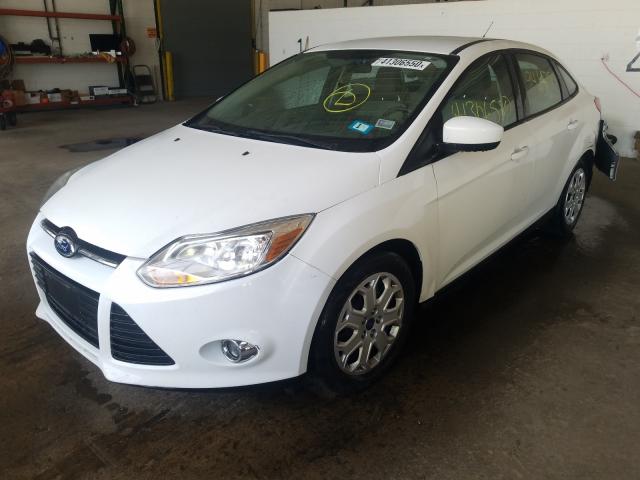 Photo 1 VIN: 1FAHP3F23CL351552 - FORD FOCUS SE 