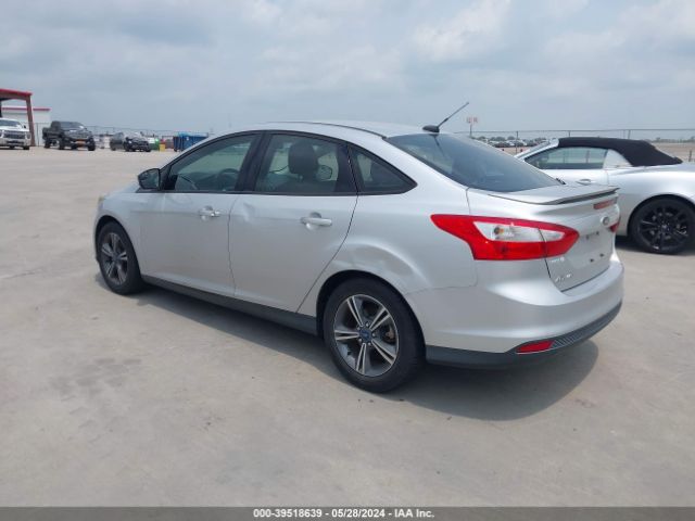 Photo 2 VIN: 1FAHP3F23CL352667 - FORD FOCUS 