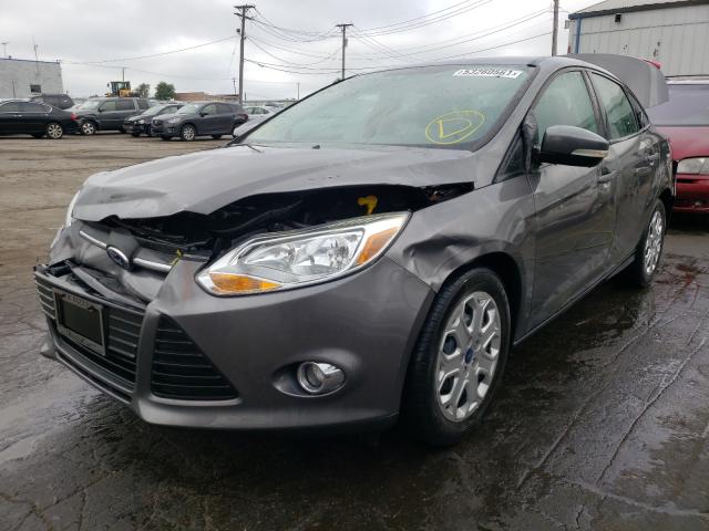 Photo 1 VIN: 1FAHP3F23CL391310 - FORD FOCUS SE 