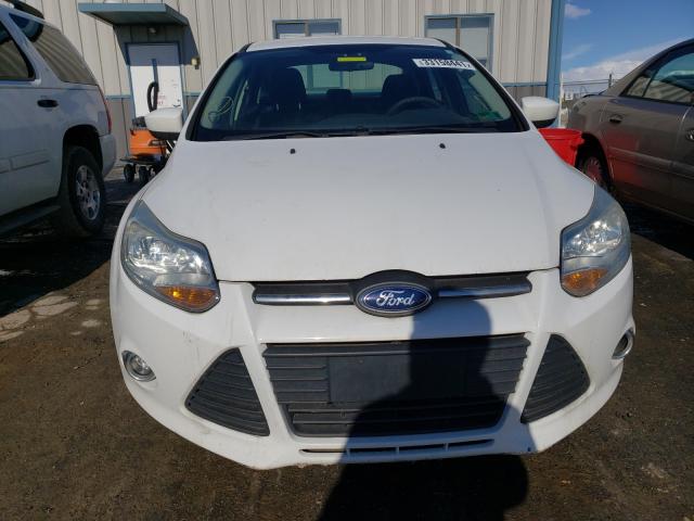 Photo 8 VIN: 1FAHP3F23CL471030 - FORD FOCUS SE 