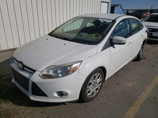 Photo 1 VIN: 1FAHP3F24CL115220 - FORD FOCUS SE 