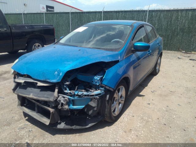 Photo 1 VIN: 1FAHP3F24CL174638 - FORD FOCUS 