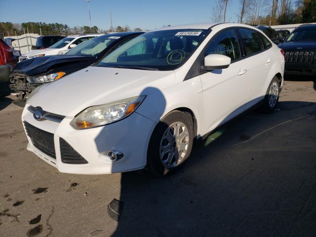 Photo 1 VIN: 1FAHP3F24CL185638 - FORD FOCUS SE 