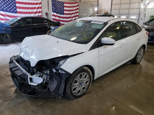 Photo 1 VIN: 1FAHP3F24CL211459 - FORD FOCUS SE 