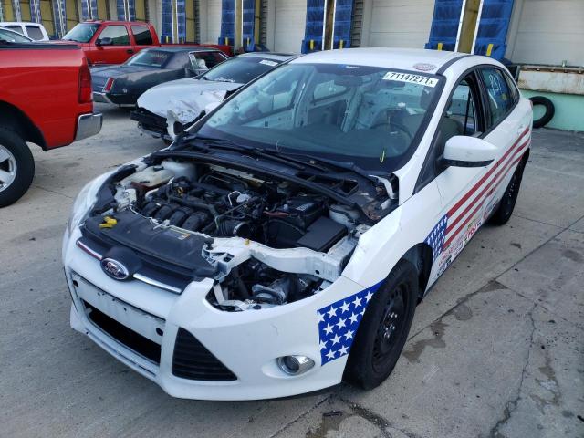 Photo 1 VIN: 1FAHP3F24CL277803 - FORD FOCUS SE 