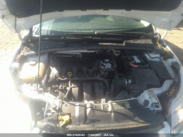 Photo 9 VIN: 1FAHP3F24CL313280 - FORD FOCUS 