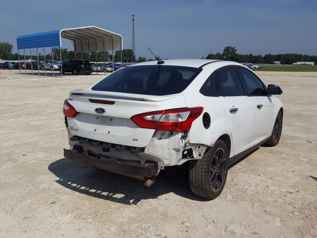 Photo 3 VIN: 1FAHP3F24CL323159 - FORD FOCUS SE 