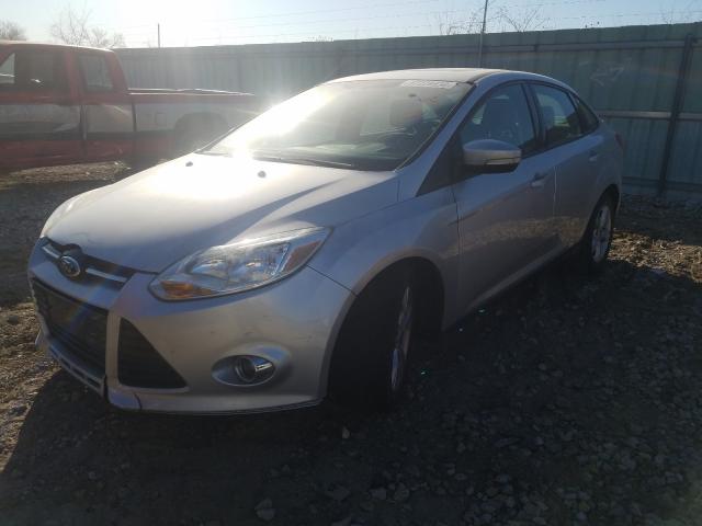 Photo 1 VIN: 1FAHP3F24CL328720 - FORD FOCUS 