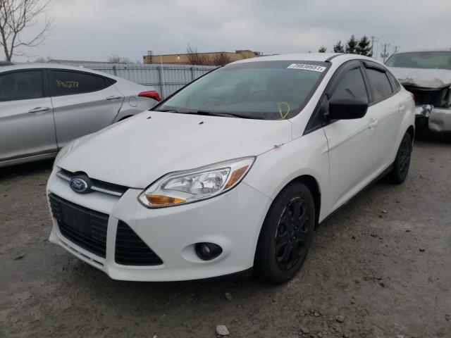 Photo 1 VIN: 1FAHP3F24CL334761 - FORD FOCUS SE 