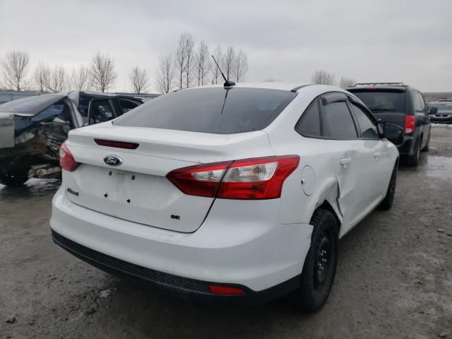 Photo 3 VIN: 1FAHP3F24CL334761 - FORD FOCUS SE 