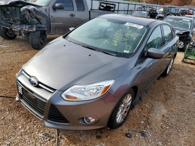 Photo 1 VIN: 1FAHP3F24CL394832 - FORD FOCUS SE 