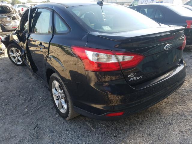 Photo 2 VIN: 1FAHP3F24CL402086 - FORD FOCUS SE 