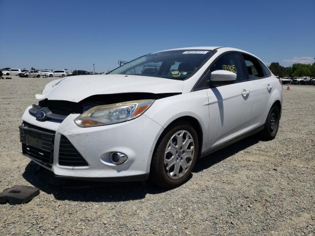 Photo 1 VIN: 1FAHP3F25CL140076 - FORD FOCUS SE 