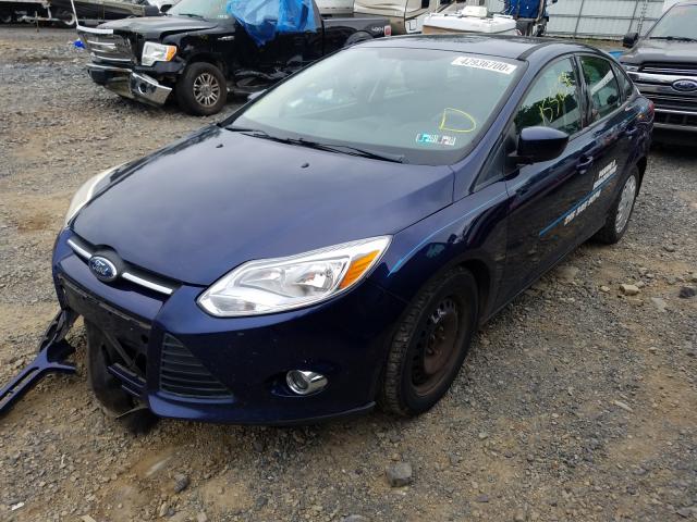 Photo 1 VIN: 1FAHP3F25CL150185 - FORD FOCUS SE 