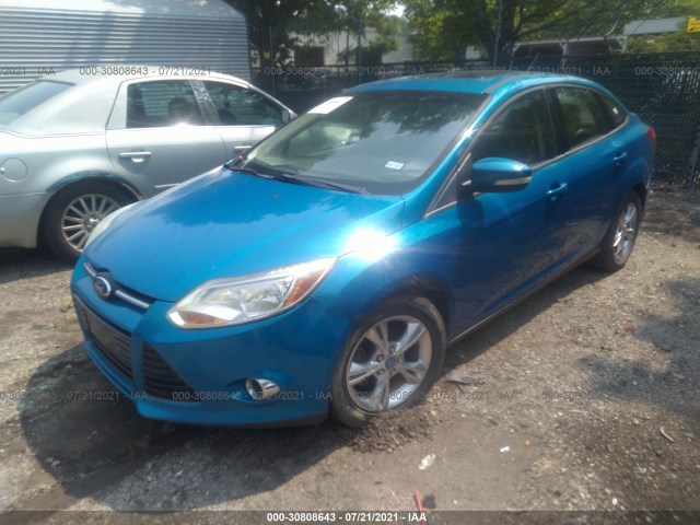 Photo 1 VIN: 1FAHP3F25CL174292 - FORD FOCUS 